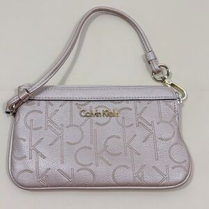 Calvin Klein signature metallic tan wristlet​​​​​​​​​​